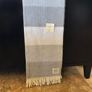Gray and white chevron striped throw